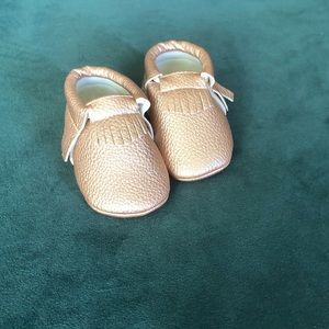 Rosé gold baby moccasins